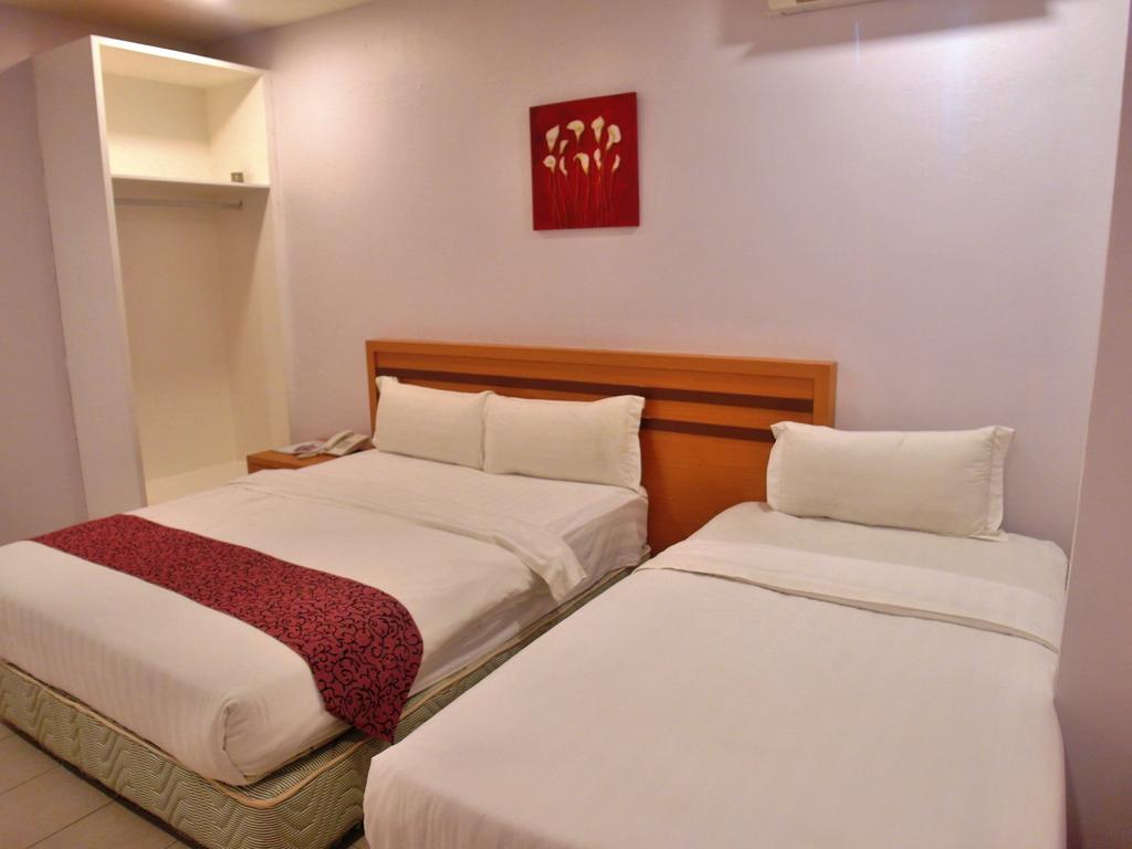 Transit Hotel Labuan Habitación foto