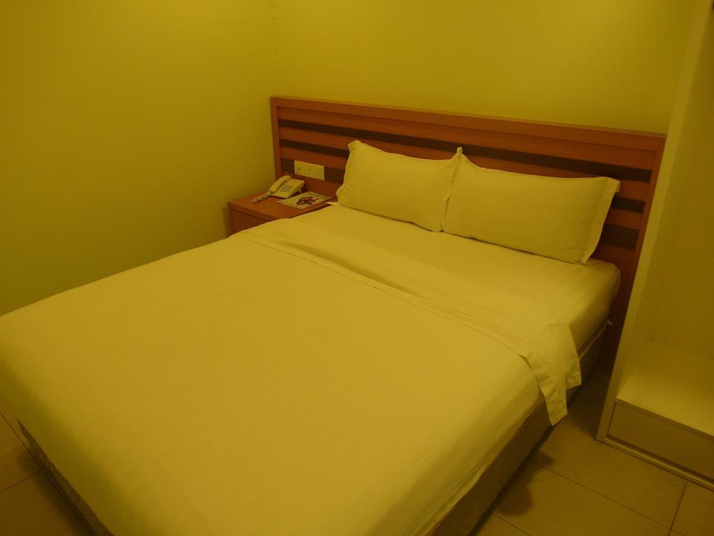 Transit Hotel Labuan Habitación foto